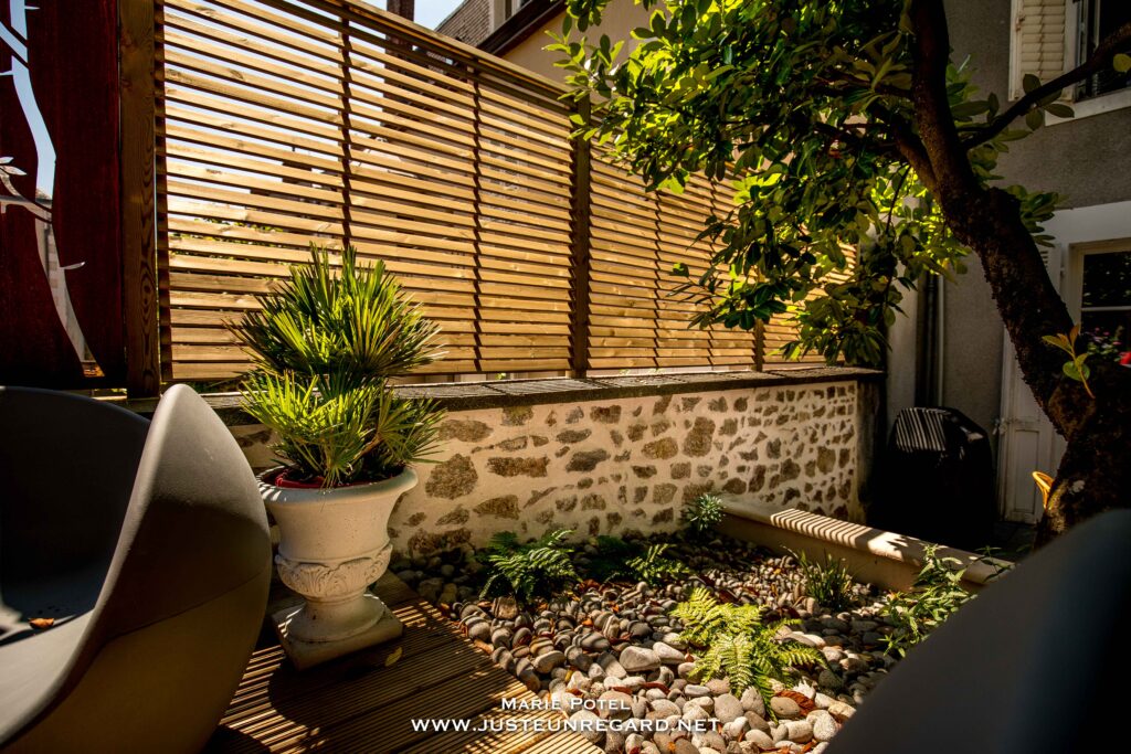 rebeyrol, rebeyrol, créateur de jardins, limoges, 87, paysagiste, paysagiste limoges, aménagement de jardin, aménagement de jardin limoges, clôture en bois sur muret en pierre limoges